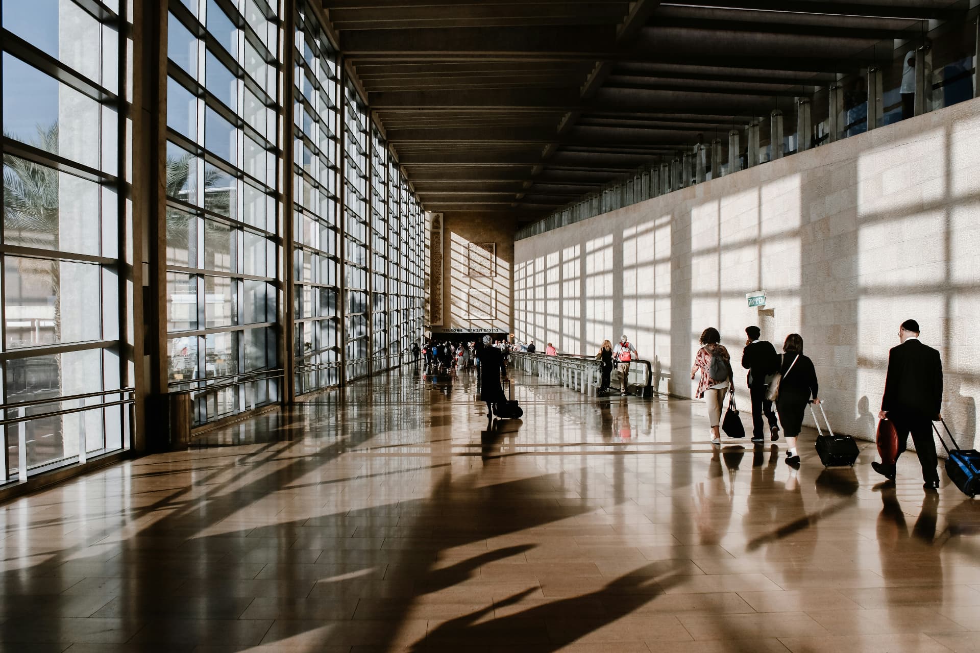 Modern airport terminal with travelers